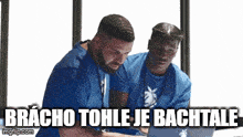two men are looking at a laptop with the caption bracho tohle je bachtale .