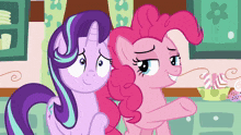 pinkie pie and starlight glimmer from my little pony are sitting next to each other
