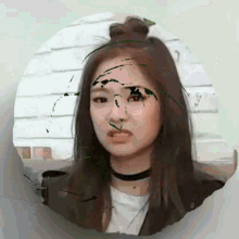 a picture of a woman with a bun on her hair