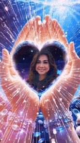 a woman is holding a heart in her hands with bubbles coming out of it