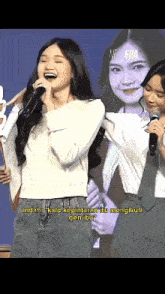 a girl singing into a microphone with the word era on the bottom