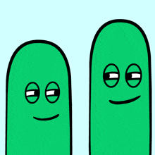 a cartoon drawing of two green objects with smiley faces