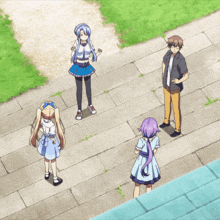 a group of anime characters are standing on a brick sidewalk