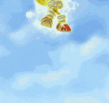 sonic the hedgehog is flying through the air with a blue sky behind him