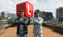 two men standing next to each other on a balcony with a red cube with a letter l on it