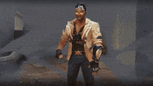 a man holding a gun with the letters gp on his gloves