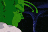 a close up of a green cartoon character with a dark background
