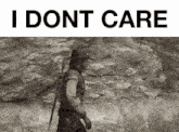 a black and white photo of a cowboy with the words i dont care