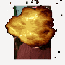 a pixel art of a person with a large explosion in front of their face