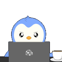 a penguin is sitting in front of a laptop
