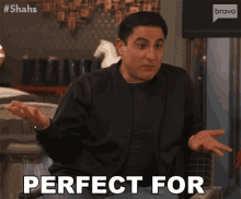 a man in a black jacket says " one another " in front of a bravo logo