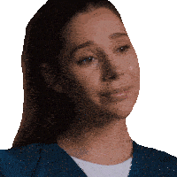 a woman wearing a blue scrub top looks sad