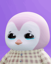 a pink and white penguin with a plaid shirt on is crying