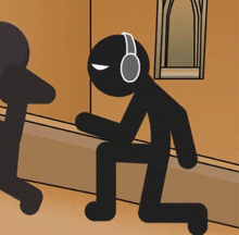 a stick figure wearing headphones is kneeling down in front of a chair .
