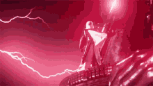 a person is standing on top of a building with lightning coming from the sky .