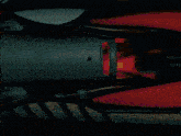 a close up of a red object with a circle in the middle