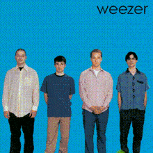 a group of men standing next to each other on a blue background with the word weezer on it