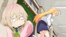 two anime girls are standing next to each other with one making a face