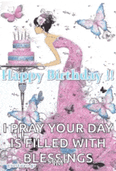 a woman in a pink dress is standing in front of a cake with butterflies .