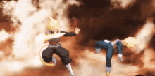 a couple of anime characters are fighting each other in a cloudy sky .