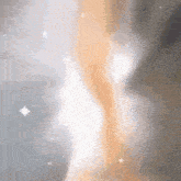 a close up of a person 's face in a cloudy sky