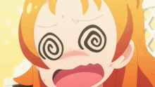 a close up of a girl 's face with a spiral in her eyes