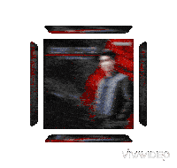 a blurred image of a man in a black and red jacket