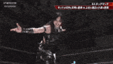 a female wrestler is being pinned by another wrestler in a stardom match