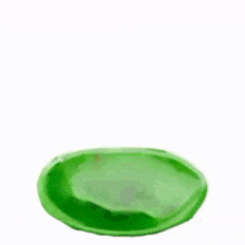 a green baygon cup on a green saucer