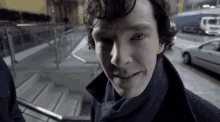 a close up of a man 's face looking at the camera
