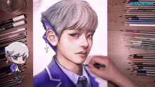 a drawing of a boy with a cross on his ear is on a table next to a bunch of colored pencils