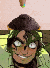 a close up of a cupcake next to a cartoon character with green hair