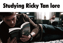 a man is reading a book titled supernatural