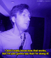 a man wearing eos camera strap says i do n't really know