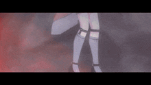 a close up of a person 's legs in a dark room with smoke coming out of them .