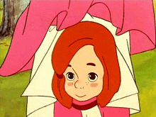 a little girl with red hair and freckles is wearing a pink and white dress