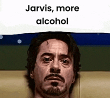 a close up of a man 's face with the words jarvis , more alcohol above it