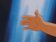 a cartoon hand is reaching out in front of a blue curtain