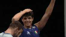 a man wearing a jersey with bigmat on it