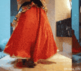 a woman in a red dress is standing in front of a mirror with the hashtag @ruuno_070
