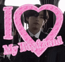 a picture of a man in a suit and tie with a heart that says i love my boyfriend