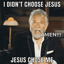 a man with a beard is pointing at the camera with the caption i didn 't choose jesus amen jesus chose me
