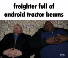 two men laying on a pile of money with the words freighter full of android tractor beams