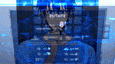 a man is looking at a screen that says 2utay2