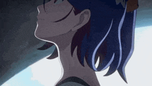 a close up of a person 's head with blue hair