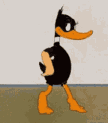a cartoon duck standing next to a wall