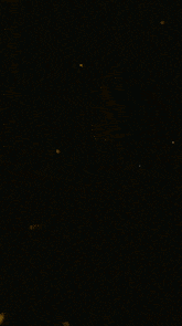 a yellow background with a glowing circle in the middle