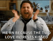 a man in a tie is screaming in a kitchen with the words me rn because the two love interests kissed