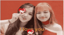 two girls are standing next to each other with hearts in their eyes and the words " i love you "