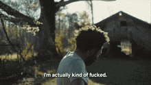 a man says i 'm actually kind of fucked in front of an old barn